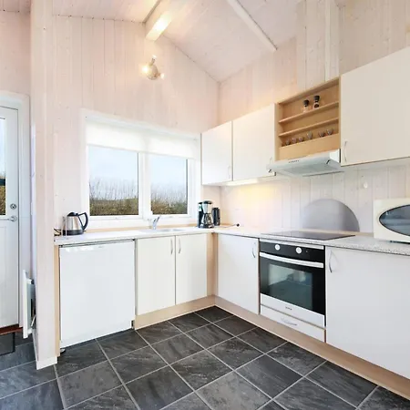 With A And Sauna By The Water Holiday home
