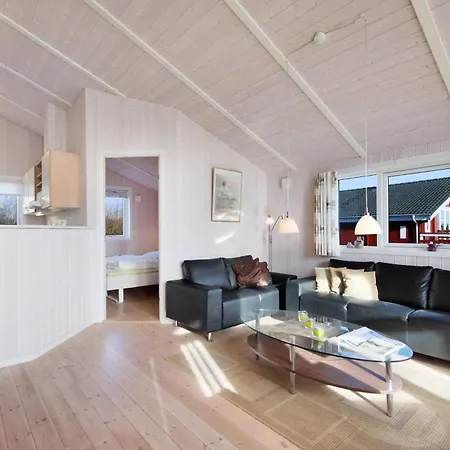 With A And Sauna By The Water Holiday home